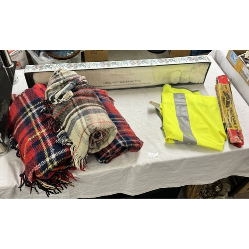 828 - An emergency reflecting triangle, hi-vis jacket and 3 picnic blankets