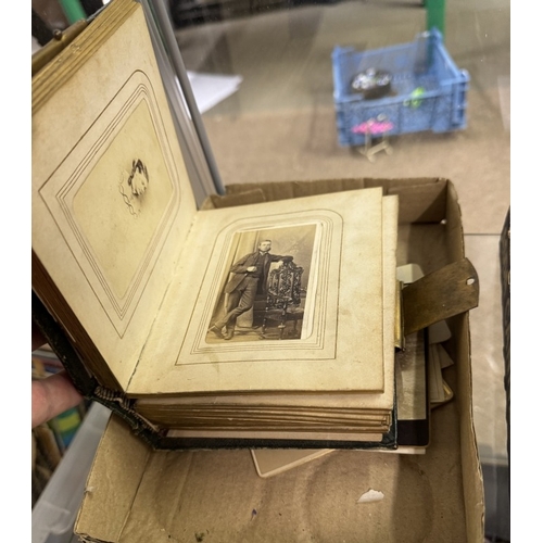 846 - A 19th century photo album with extra photos