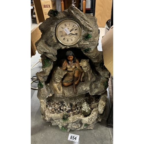 854 - A native Indian water feature clock