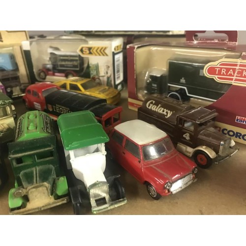 754 - A quantity of die-cast cars etc (some boxed)