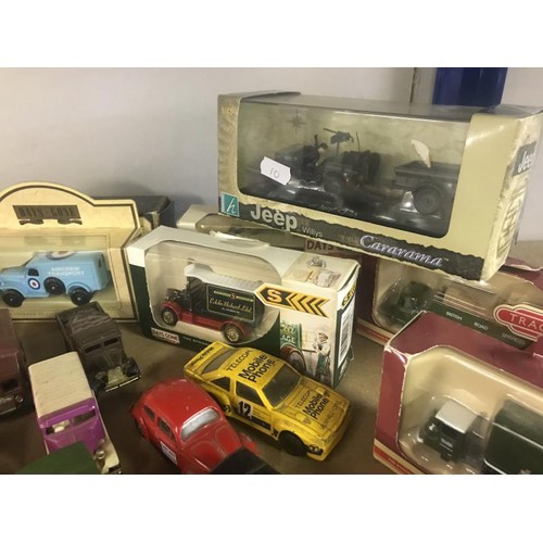 754 - A quantity of die-cast cars etc (some boxed)