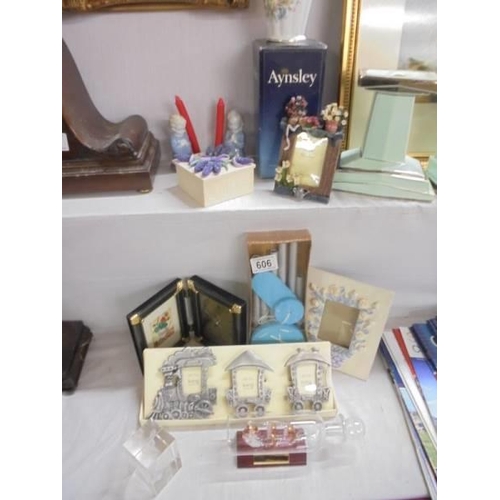 606 - A mixed lot including photo frames, Aynsley vase etc.,