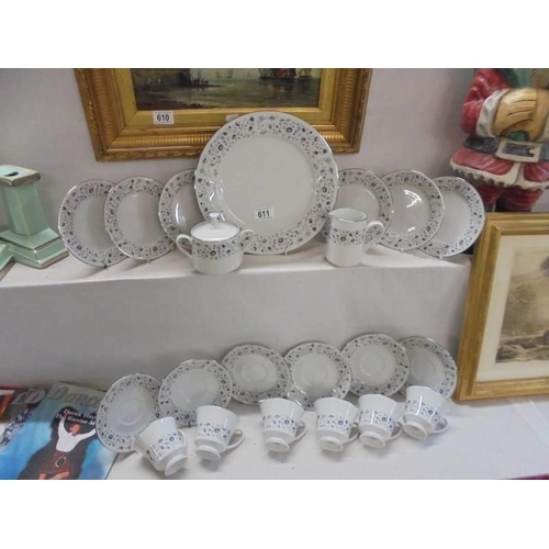 611 - A 21 piece porcelain tea set. COLLECT ONLY.