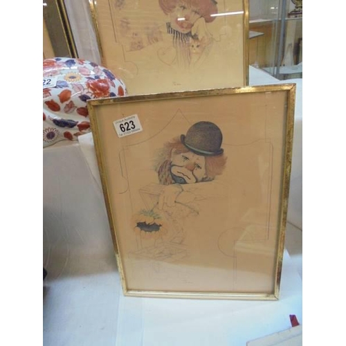 623 - A pair of framed and glazed clown prints,