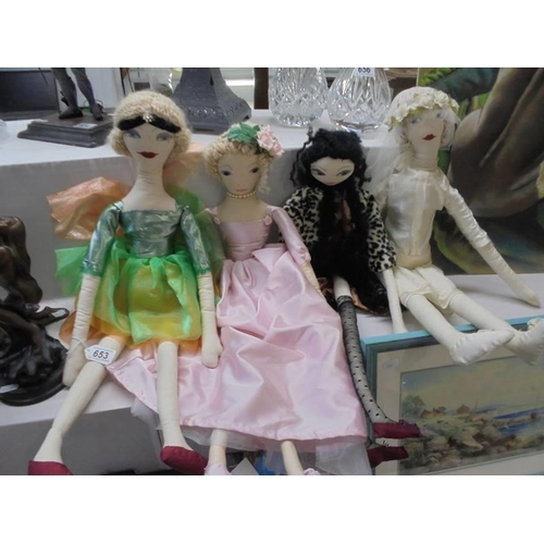 653 - Four hand made art dolls.