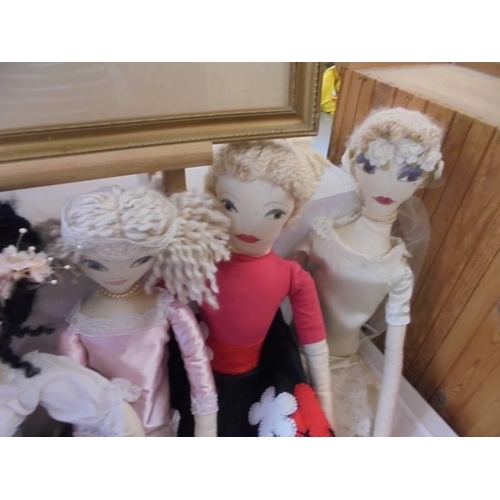 661 - Five hand made art dolls.