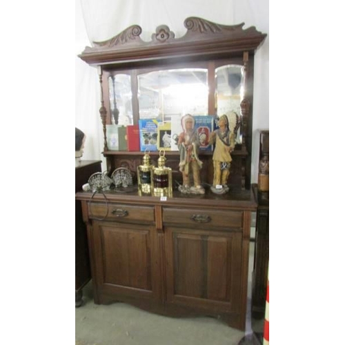 672 - A mid 20th century two door, two drawer mirror back sideboard, COLLECT ONLY.