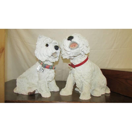 673 - Two Scottie dog figures.