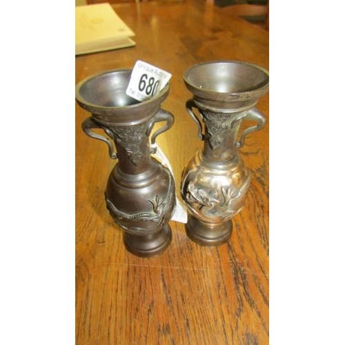 680 - A pair of early 20th century bronze urns.