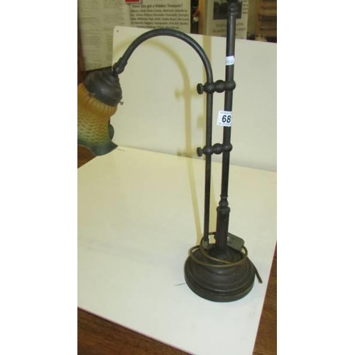 681 - An adjustable brass desk lamp.