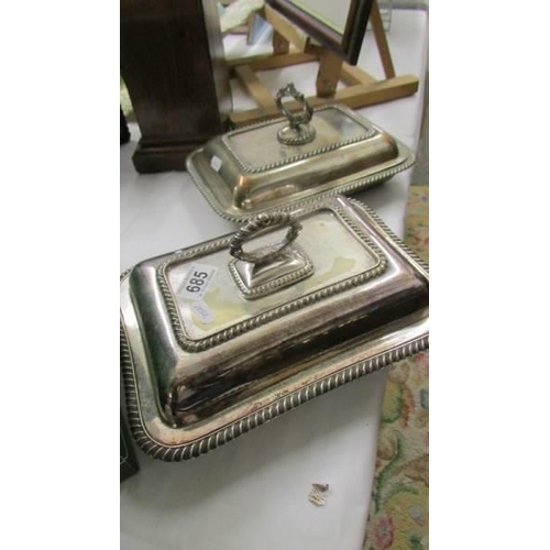 685 - A pair of silver plate vegetable tureens.