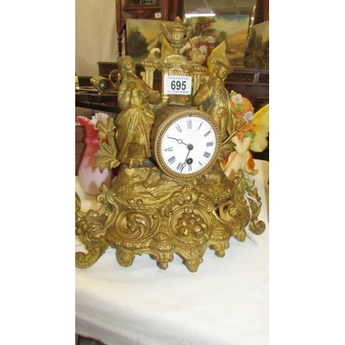 695 - An old French mantle clock.