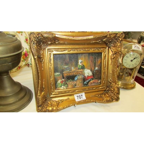 707 - A good gilt framed interior scene.