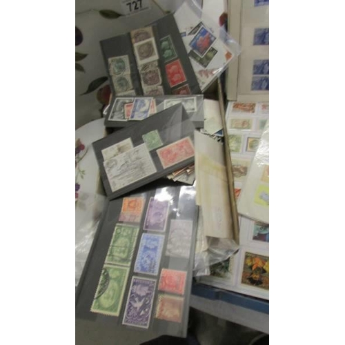 728 - A good lot of assorted loose postage stamps.