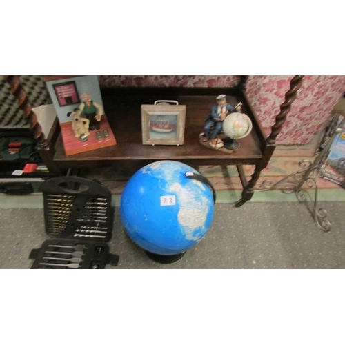 752 - A table globe, a Wallace and Gromit ornament and two other items.