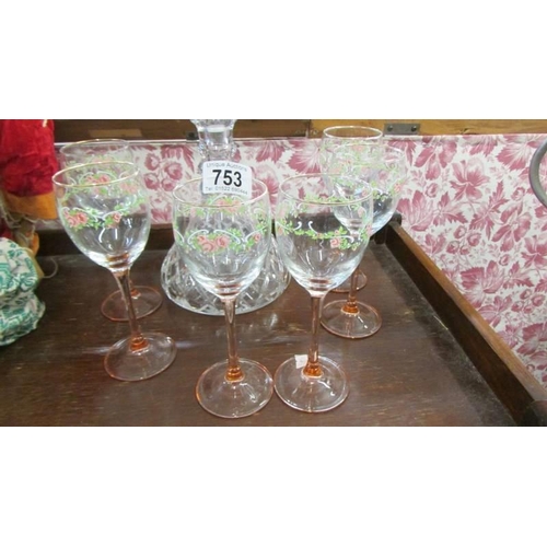 753 - A good cut glass decanter and six hand painted wine glasses. COLLECT ONLY.