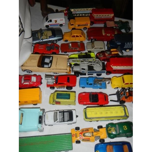 803 - Approximately 40 assorted die cast cars.