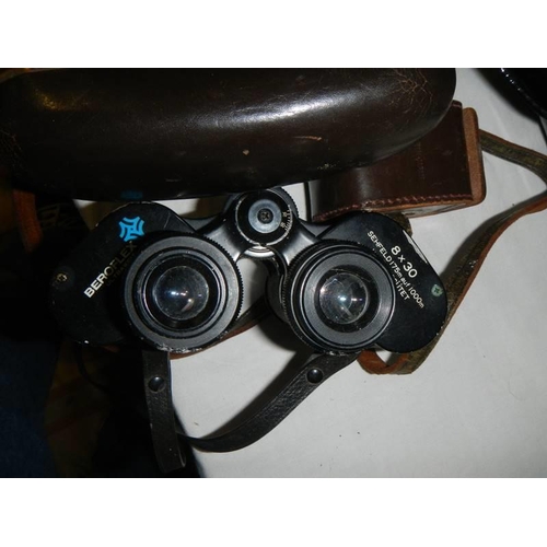 806 - A vintage Seiko Aries camera and a pair of Beroflex 8 x 30 binoculars.