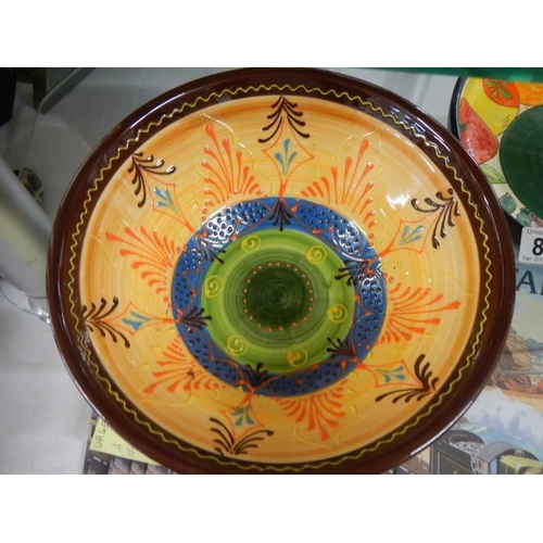 811 - Two hand painted continental ceramic bowls.