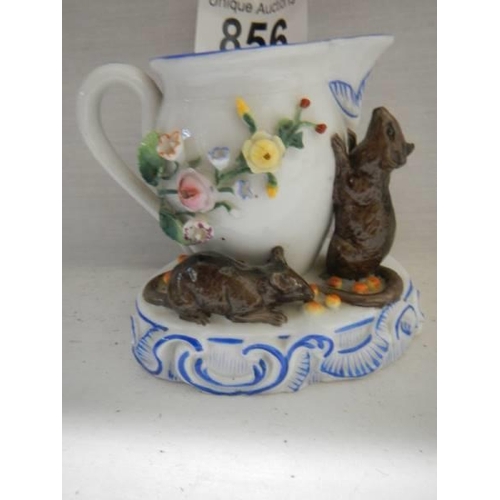 856 - An early 20th century jug featuring mice.