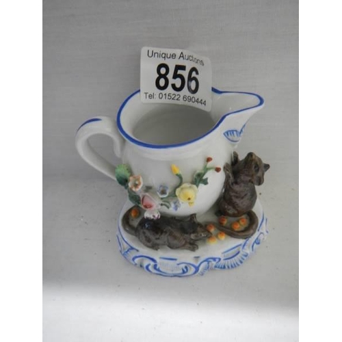 856 - An early 20th century jug featuring mice.