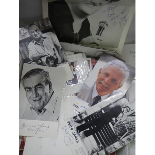 858 - A mixed lot of film and television ephemera including signed photographs.