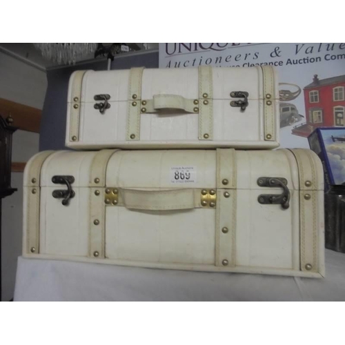 869 - Two cream suitcase style storage boxes, COLLECT ONLY.