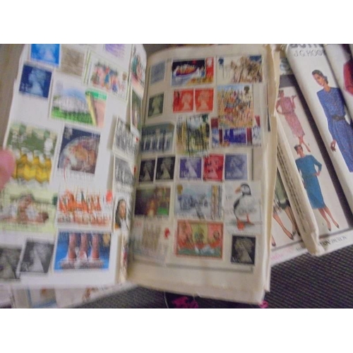 872 - Two small albums of old postage stamps.