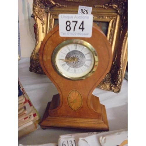 874 - An Edwardian mahogany inlaid mantle clock.