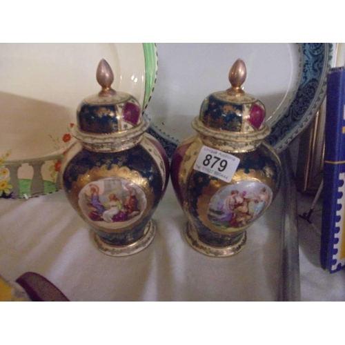 879 - A pair of Imari style Czechoslovakian ginger jars.