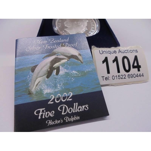 1104 - A New Zealand silver frosted proof 2002 five dollar coin- Hector's Dolphin.