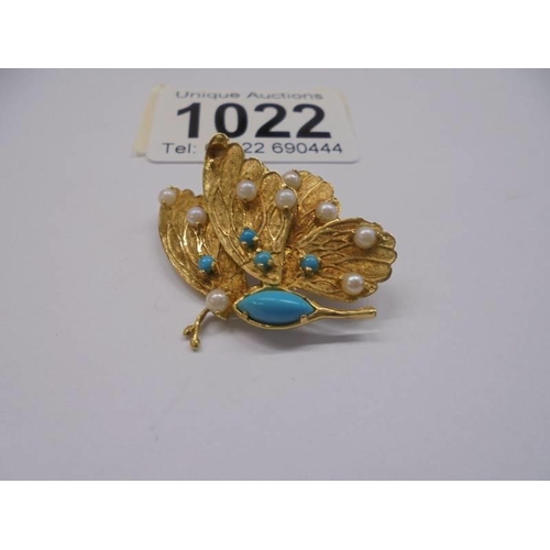 1022 - A gold butterfly brooch set seed pearls and turquoise (tests as 18ct), 6.69 grams.