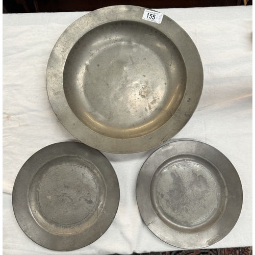 155 - Three 18th century pewter plates with various touch marks and makers marks.