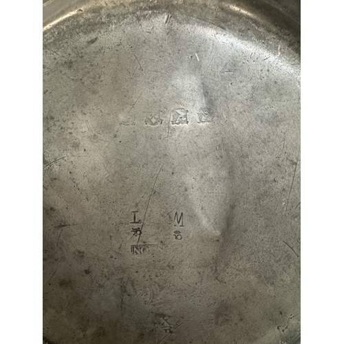 155 - Three 18th century pewter plates with various touch marks and makers marks.