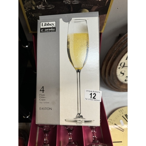 12 - 3 boxed sets of wine glasses and flutes