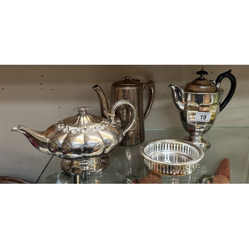 19 - 4 pieces of silver plate including bottle coaster tea and coffee pots