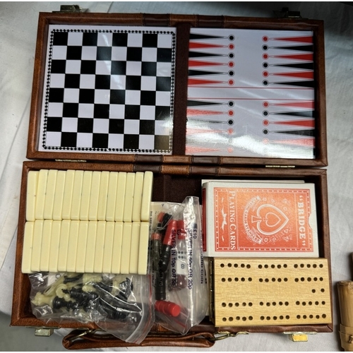 28 - A boxed chess set, boxed compendium set and 3 lots of bamboo pan pipes