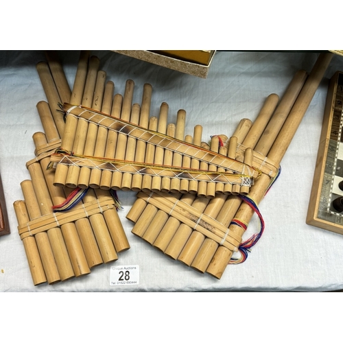 28 - A boxed chess set, boxed compendium set and 3 lots of bamboo pan pipes