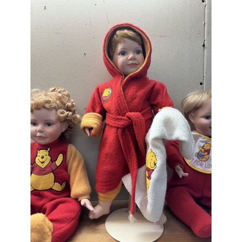 29 - 3 collectors dolls dressed in Winnie The Pooh attire