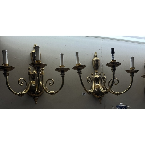 67 - 4 large 3 arm brass wall lights