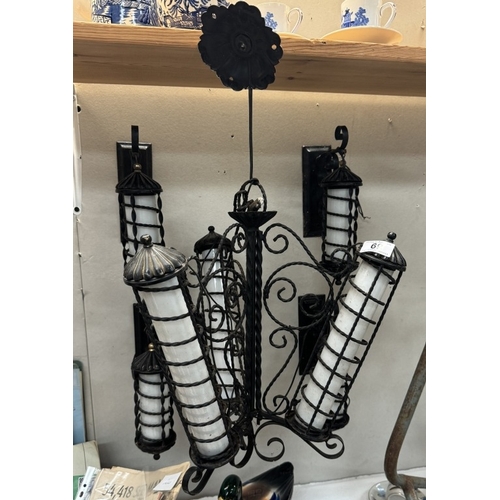 69 - A wrought iron art deco style ceiling light and 4 wall lights with white glass cylinder shades