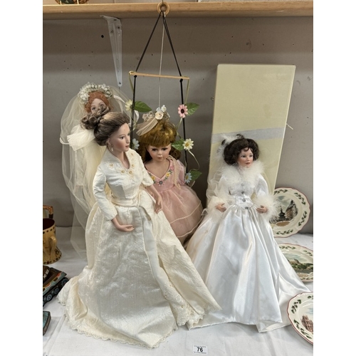 76 - 4 porcelain dolls, including 1 on a swing