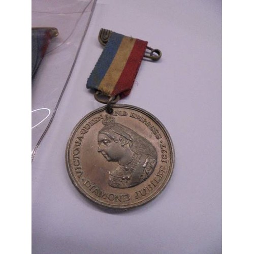 1132 - A Victorian diamond jubilee medal, Portsmouth Navy days medal, European war souvenir medal and two b... 