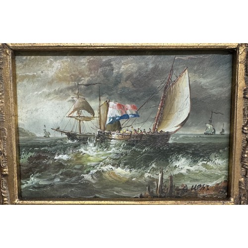 605 - A gilt framed overpainted print of a seascape.