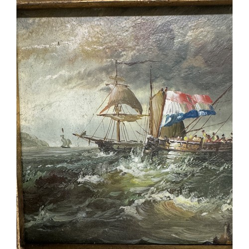 605 - A gilt framed overpainted print of a seascape.