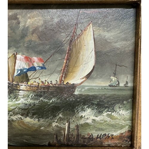 605 - A gilt framed overpainted print of a seascape.