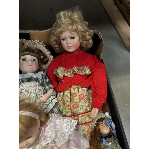 103 - A box of porcelain dolls