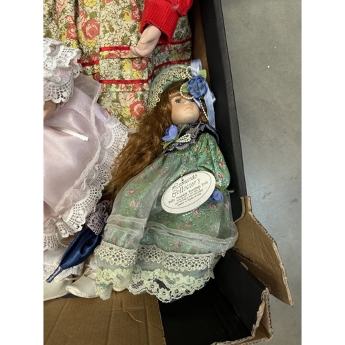 103 - A box of porcelain dolls