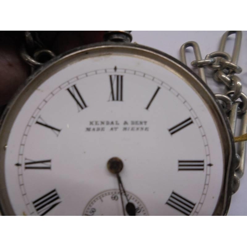 1041 - A Kendall & Denti hall marked silver pocket watch on a white metal chain.