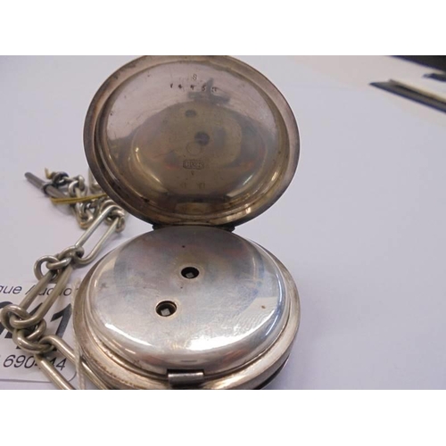 1041 - A Kendall & Denti hall marked silver pocket watch on a white metal chain.